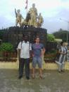 The two of us in front of a statue.